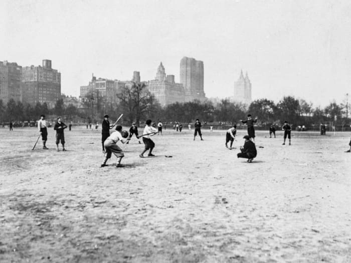 Boys from the St. Thomas school, just across 59th Street, reap the rewards of Olmsted and Vaux's civic gift in 1934.